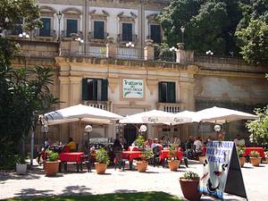 Breezy tables in the heat of summer Palermo @ Trattoria del Pesce