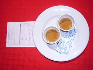 FrescaCoffee and the bill, at the Trattoria in Palermo